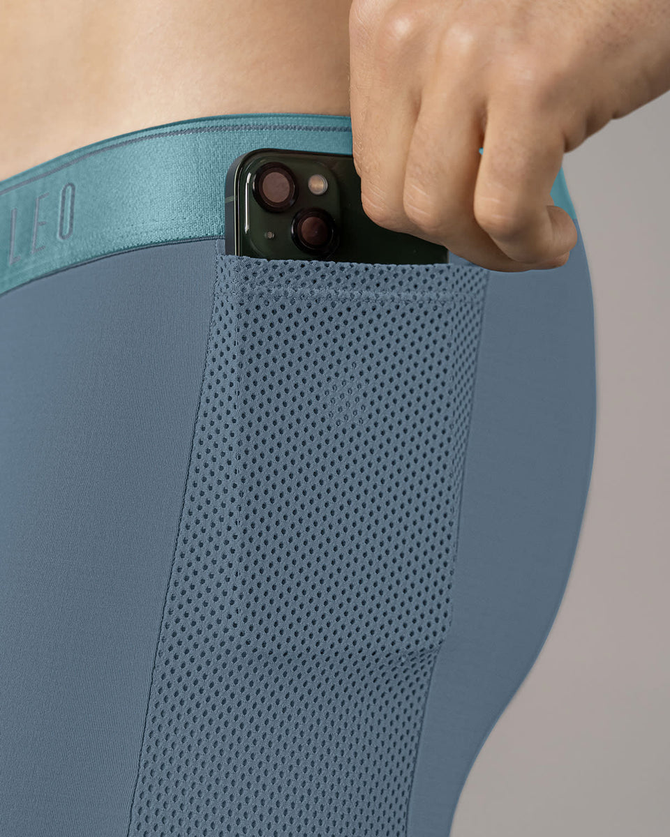 Bóxer deportivo largo con bolsillo lateral en microfibra