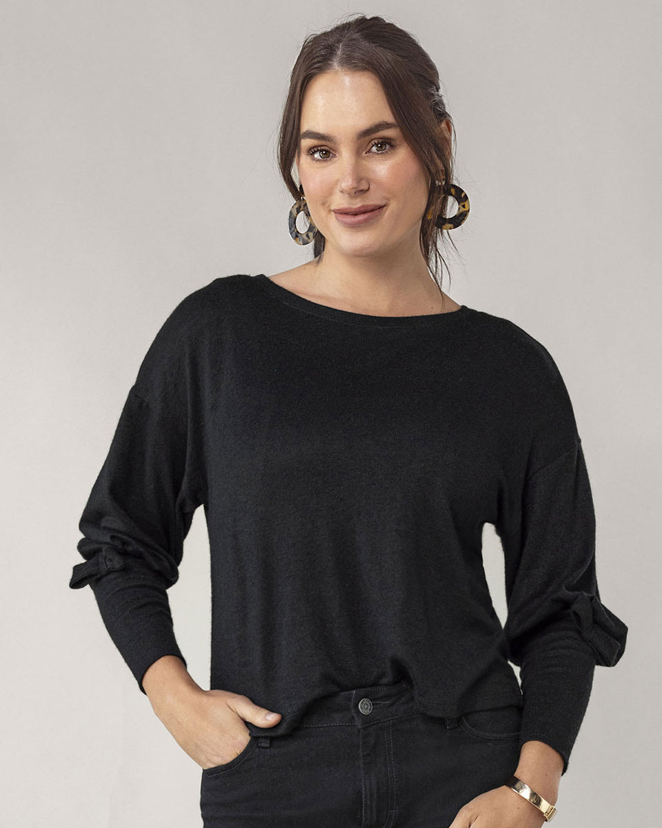 Polerón cuello redondo mangas con volumen