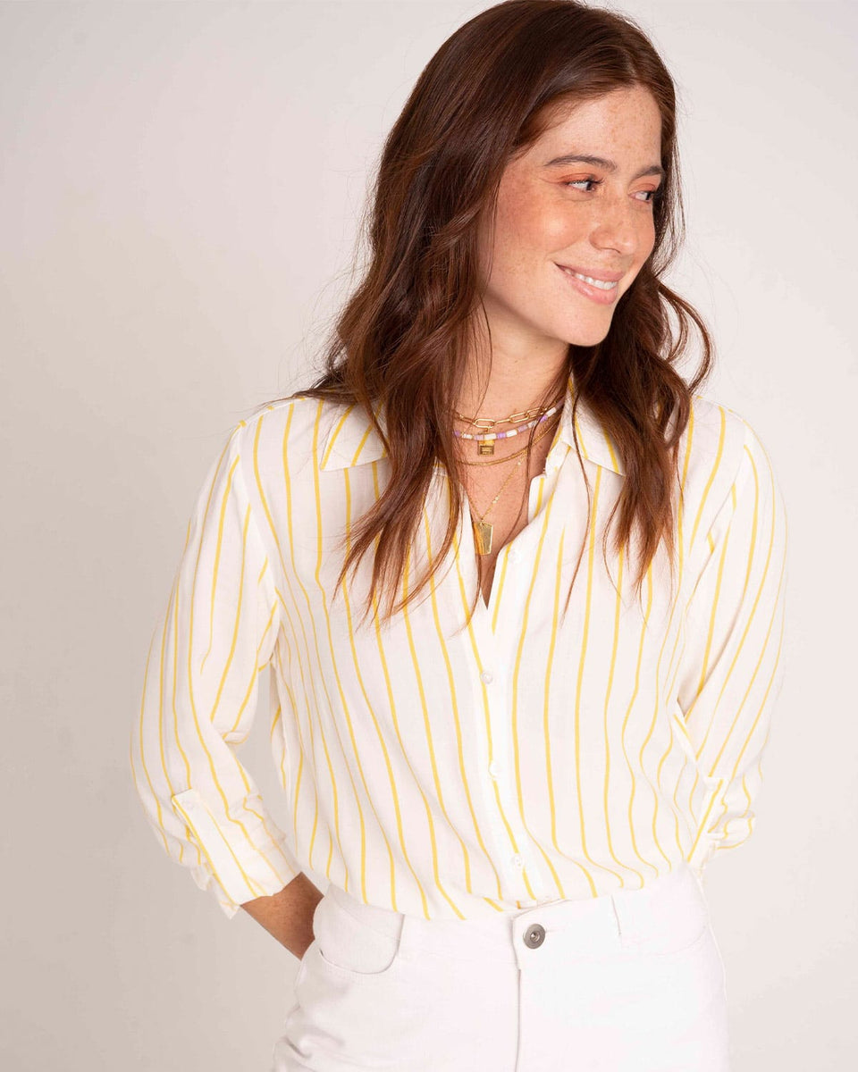 Blusa manga larga con charretera y botón