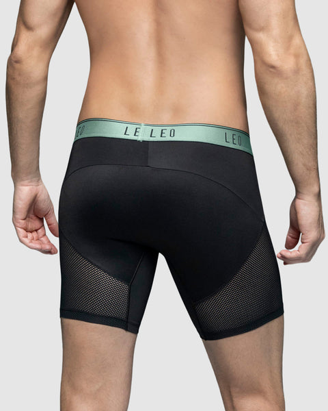 boxer-medio-de-secado-rapido-con-mallas-transpirables-en-microfibra#color_079-negro-con-elastico-verde-claro