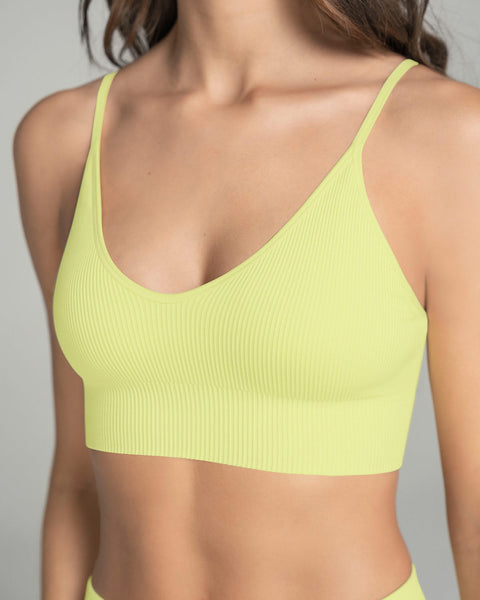 Top en tecnología seamless con textura acanalada Natural Comfort#color_b48-amarillo-neon