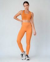 Top sin costuras reversible con soporte alto de busto#color_203-naranja