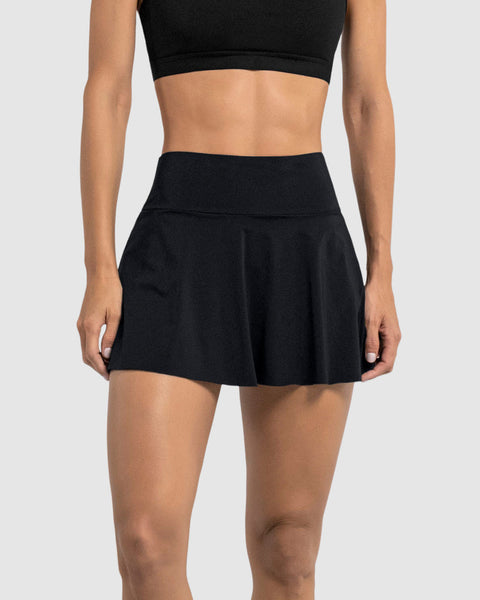 Falda deportiva con short interno con bolsillo#color_700-negro