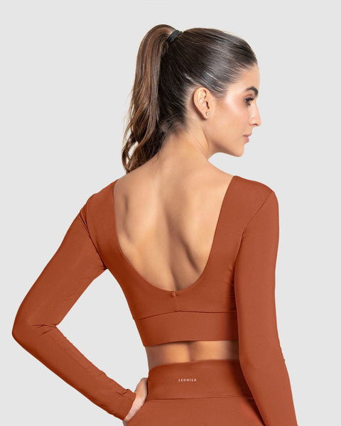 Crop top deportivo manga larga con protección UV#color_221-terracota