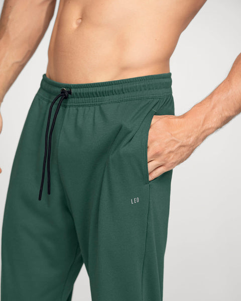 Jogger deportivo estilo sudadera con bolsillos laterales funcionales#color_611-verde