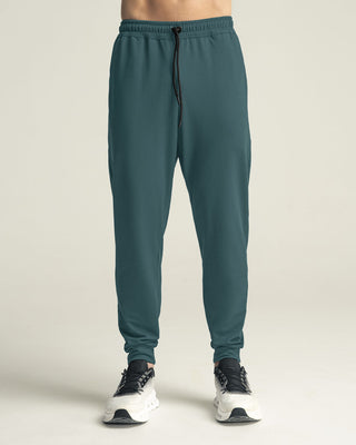 Jogger deportivo estilo sudadera con bolsillos laterales funcionales#color_678-verde
