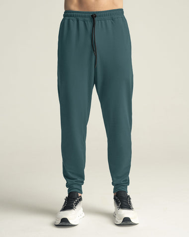 Jogger deportivo estilo sudadera con bolsillos laterales funcionales#color_678-verde