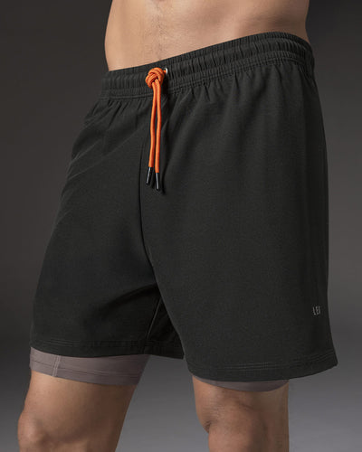 Short deportivo con bolsillo lateral con bóxer interno#color_701-negro