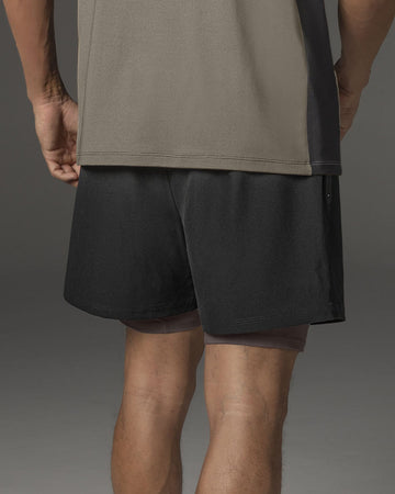 Short deportivo con bolsillo lateral con bóxer interno#color_701-negro