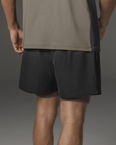 Short deportivo con bolsillo lateral con bóxer interno#color_701-negro