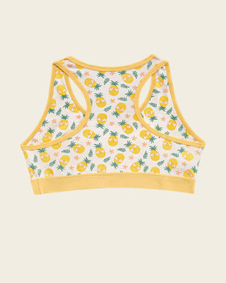 Top con espalda deportiva elaborado en algodón para niña#color_b77-marfil-estampado-pinas