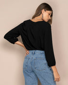 Blusa manga 3/4 con cierre funcional