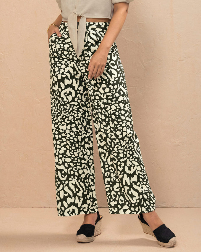 Pantalón largo tiro alto con pretina con cierre y botón funcionales#color_145-estampado-negro-blanco