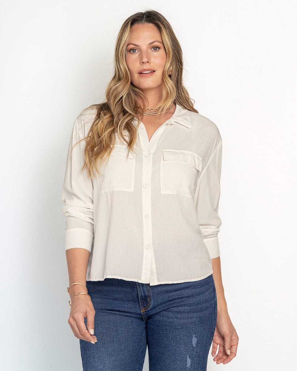 Camisa manga larga con botones y bolsillos funcionales