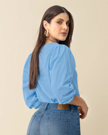 Blusa manga 3/4 con efecto volumen#color_052-azul-medio-claro