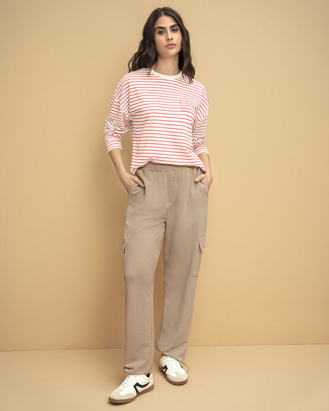 Pantalón cargo con bota elástica#color_084-arena