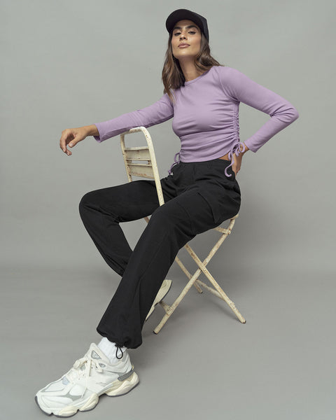 Pantalón cargo con bota elástica#color_773-negro