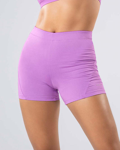 Short corto deportivo ajustado y ligero con cómodo elástico en cintura#color_410-lila-claro