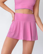 Falda deportiva con short interno con bolsillo