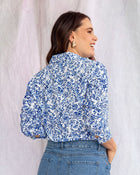 Blusa manga larga con perilla funcional y puños con botón